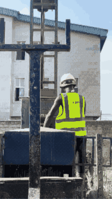 Site engineer inspecting a foundation and piling rig on site