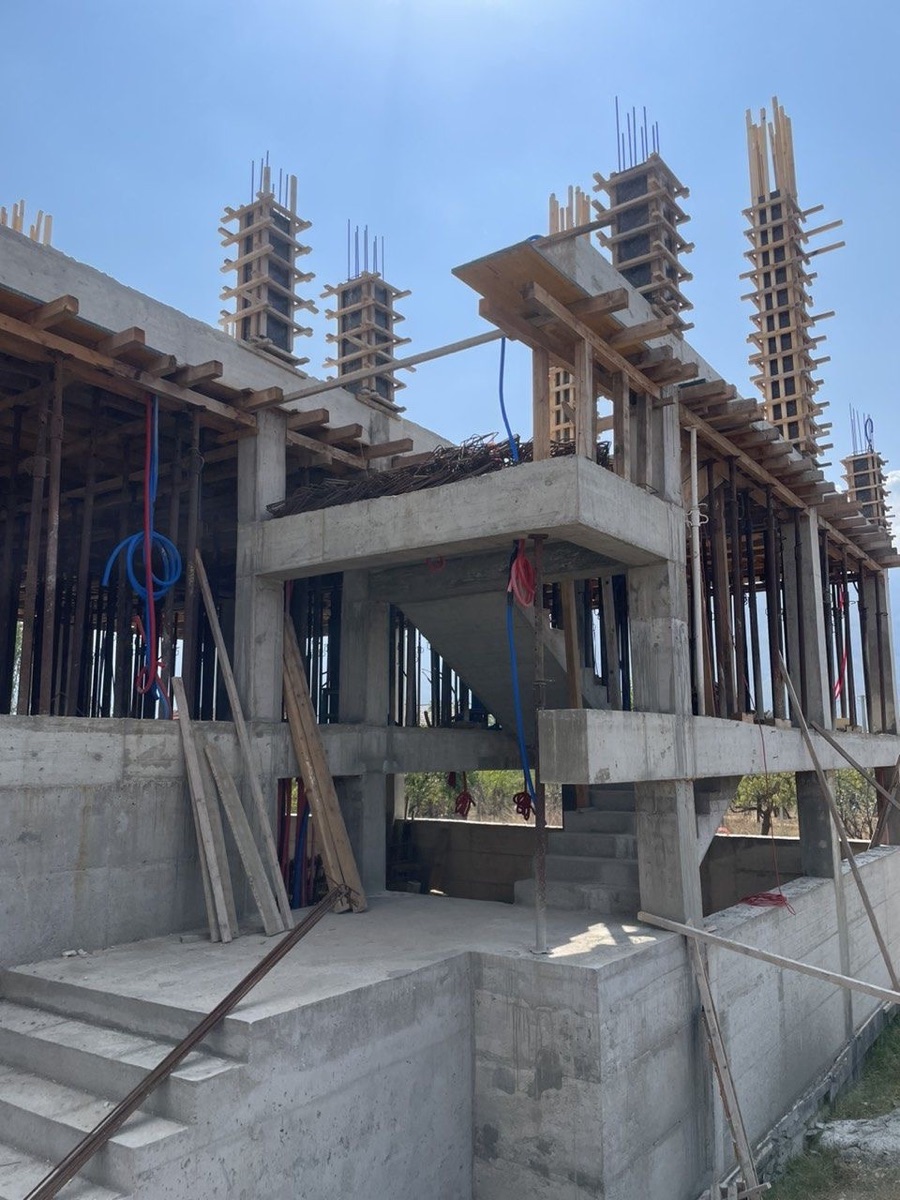 Reinforced concrete columns and structural framing on an active build